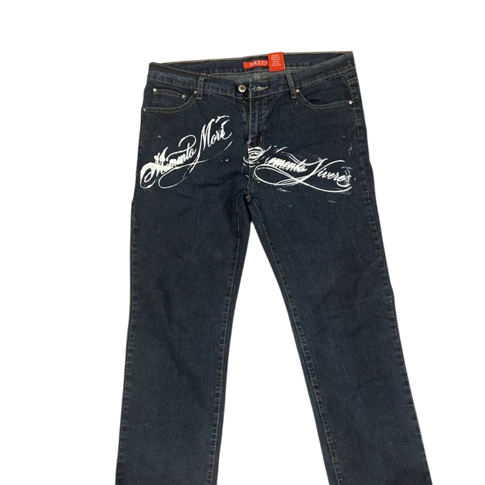 Dark denim with Memento Mori and Memento Vivere calligraphy across both front thighs
